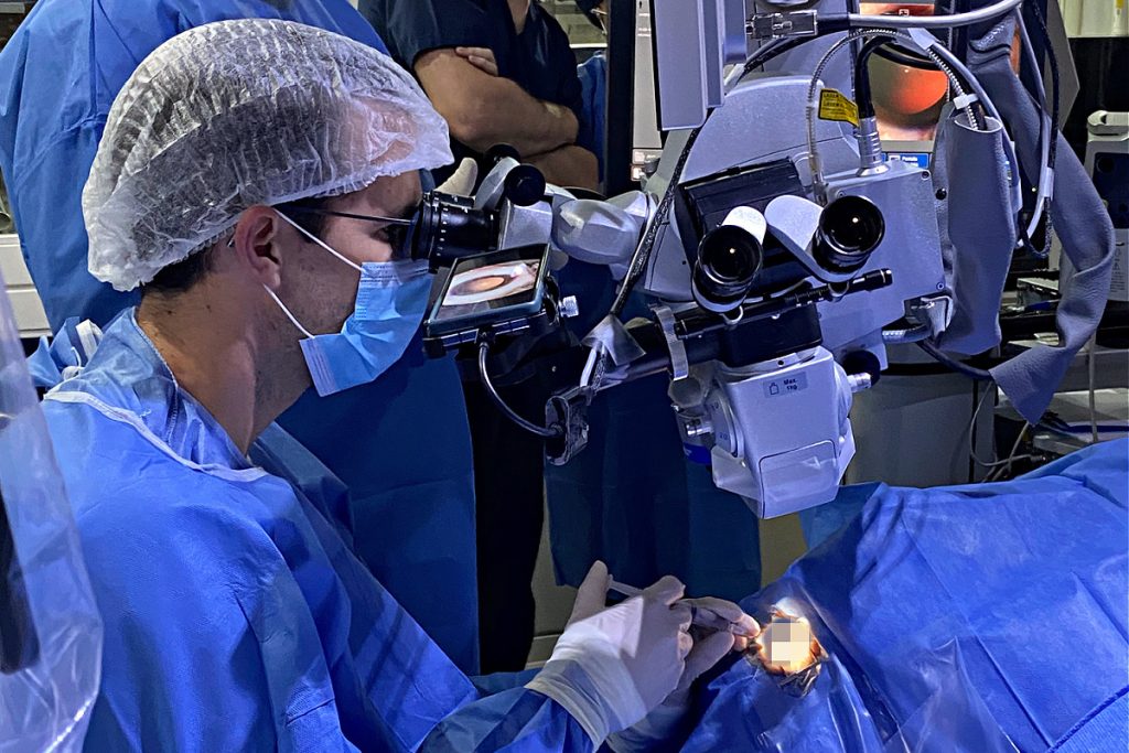 Marietta ophthalmologist Dr. Jordan Stanley places implantable collamer lens into patient's eye to correct vision and astigmatism